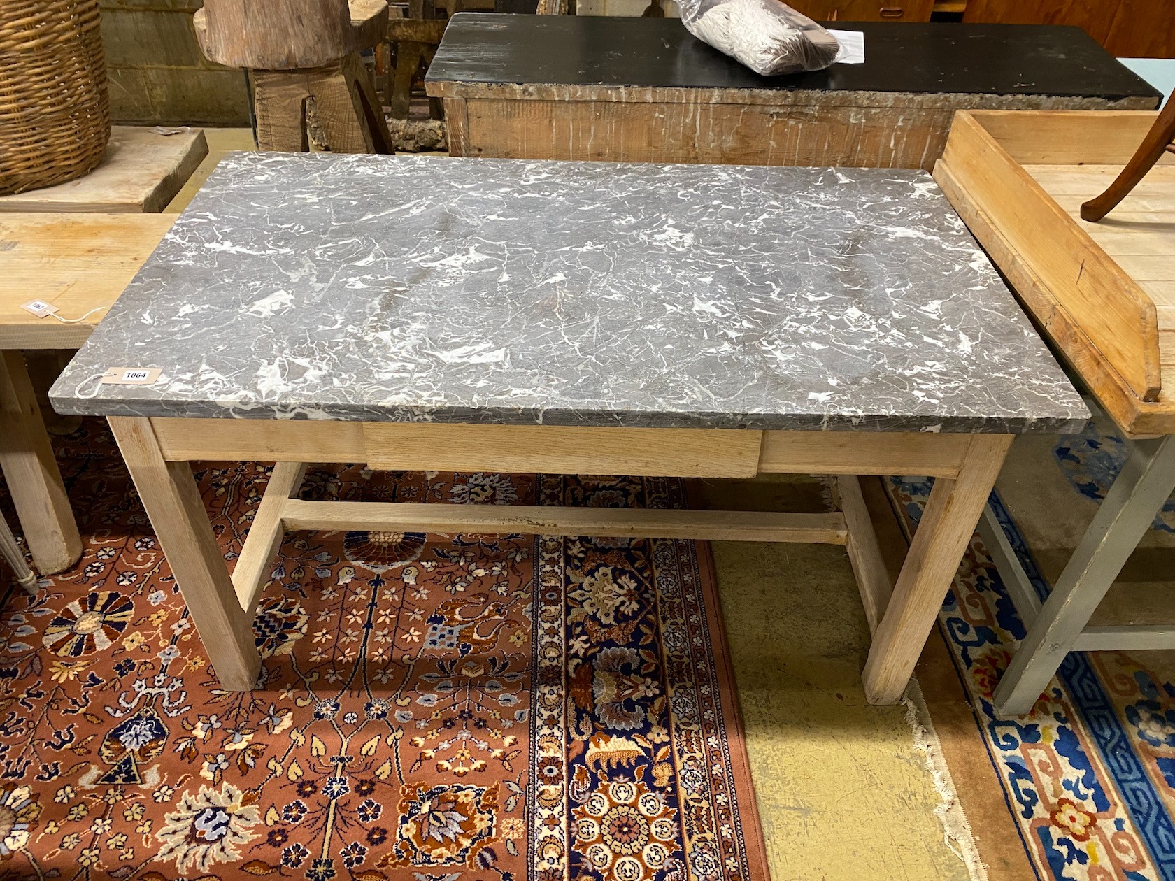 An early 20th century Continental bleached oak kitchen table with rectangular marble top, width 140cm, depth 80cm, height 77cm
